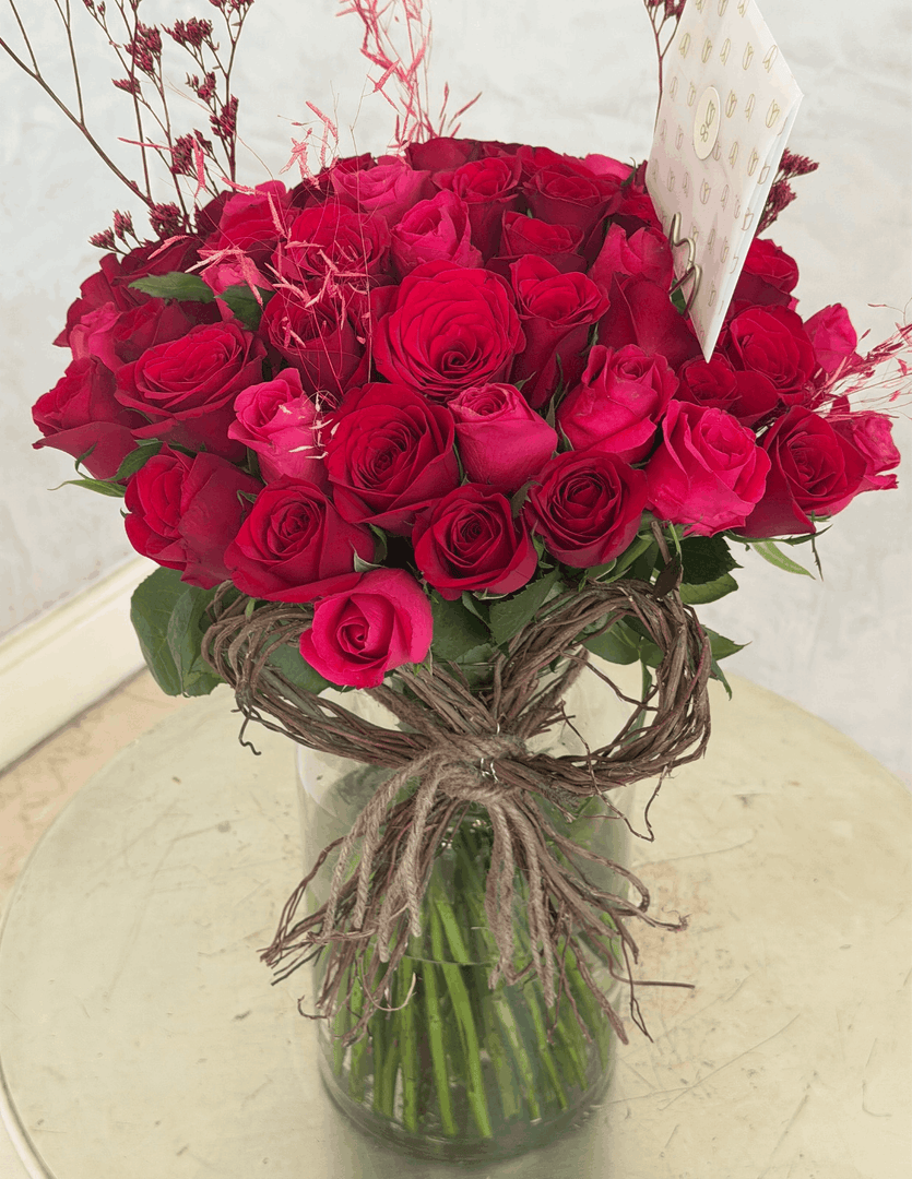 LONG STEM RED ROSES